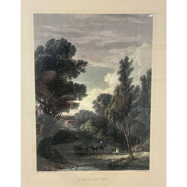 A charming English woodland landscape print titled *A Woodland View*, after a painting by Sir David Wilkie, R.A., with...