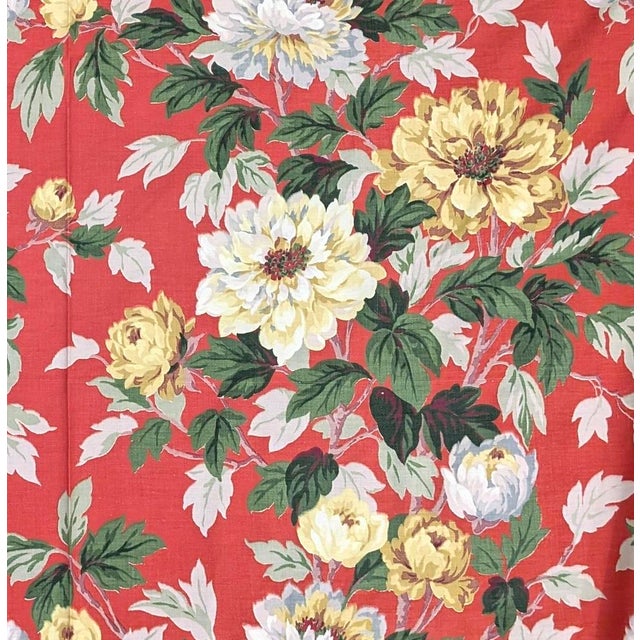 Vibrant vintage cotton home décor fabric featuring lush, peony-style blooms in yellow and ivory, with layered green...