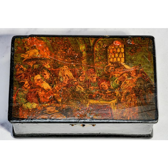 A captivating example of 19th-century decorative arts, this charming lacquer box beautifully combines functionality with...