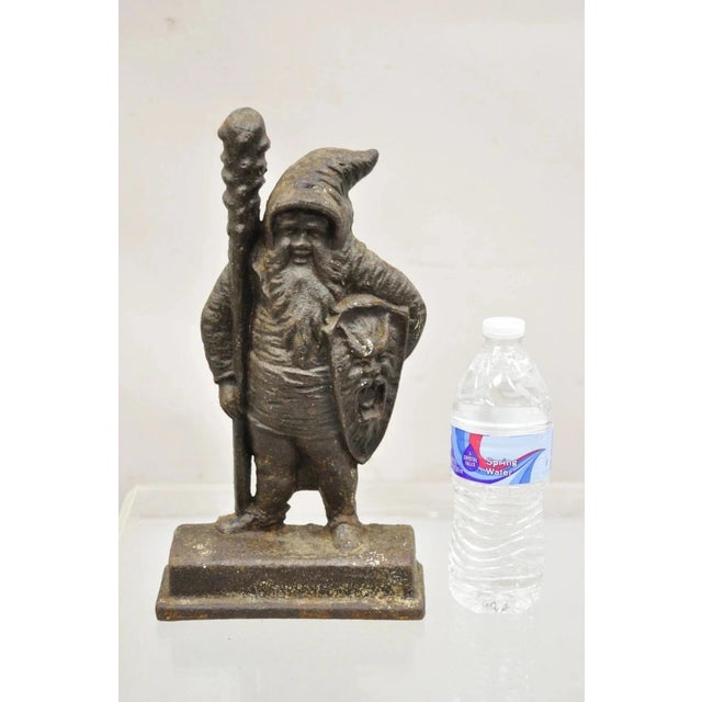 Antique Bradley & Hubbard Victorian Cast Iron Figural Warrior Gnome Doorstop. Circa Late 19th Century. Measurements: 13" H...