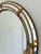 A large vintage Spanish Venetian-style beveled wall mirror, dating to the 1980s. The mirror has a decorative glass frame...