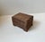 A wooden box with two compartments. Intricate hand-carved details and brass-nail decor. Manufactured during WW2 in...