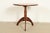 A gorgeous bench made Early American style sculpted solid walnut pedestal side table or tea table In the manner of...