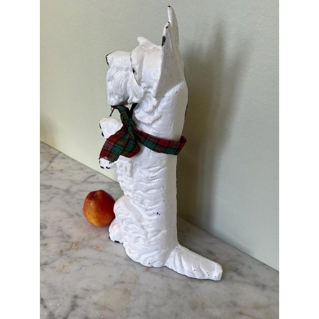 Vintage cast iron doorstop of a Scottie dog (with attitude).