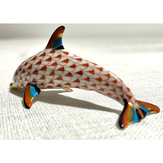 Charming and elegant, this Herend fishnet dolphin captures the playful spirit of the sea with timeless craftsmanship....