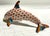 Charming and elegant, this Herend fishnet dolphin captures the playful spirit of the sea with timeless craftsmanship....