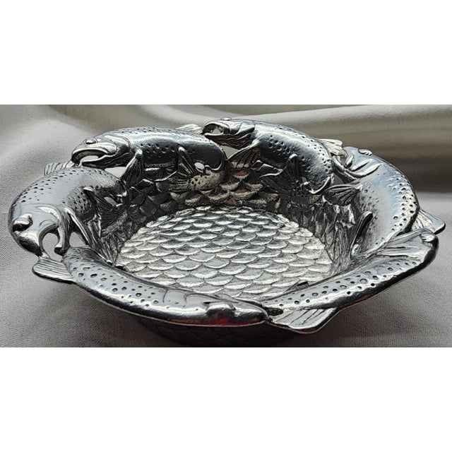 This Arthur Court wine/bottle coaster is called Jumping Spawning Salmon. The aluminum coaster will protect delicate...