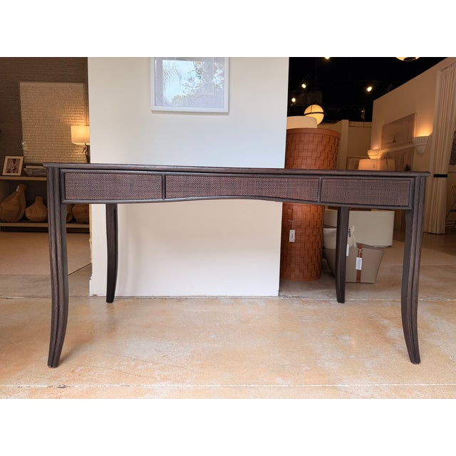 Elevate your workspace with this sophisticated contemporary writing desk, crafted in a rich espresso wood finish with...