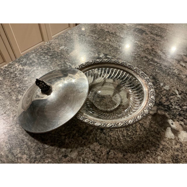 Sweet covered dish of clear glass/crystal with detailed sterling lid and pattered silver metal rim. Wonderful fruit motif...