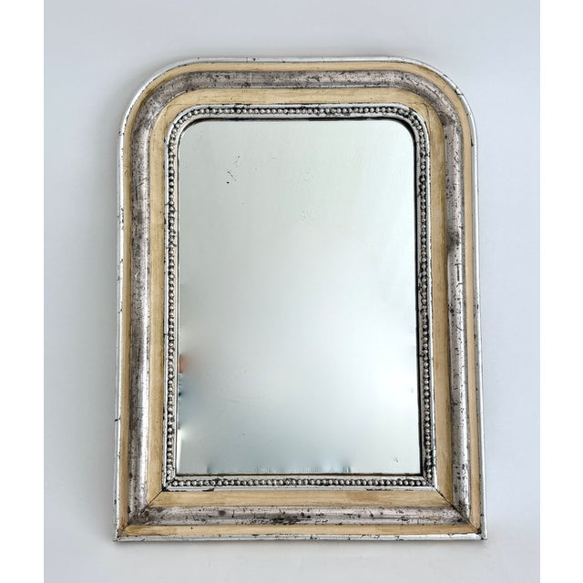 Quite possibly the best Louis I have ever had. From my French supplier, this remarkable 19th-century mirror features a...