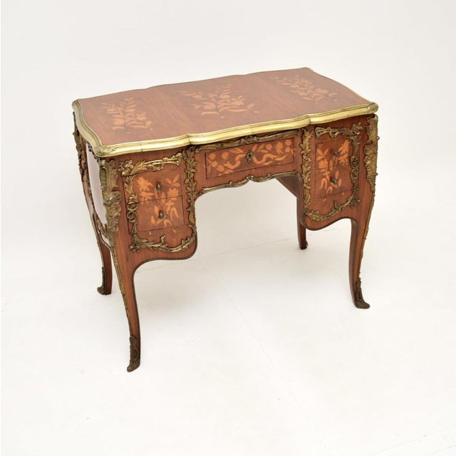 An absolutely stunning antique French knee hole desk. This was made in France, it dates from around the 1930’s. It is a...