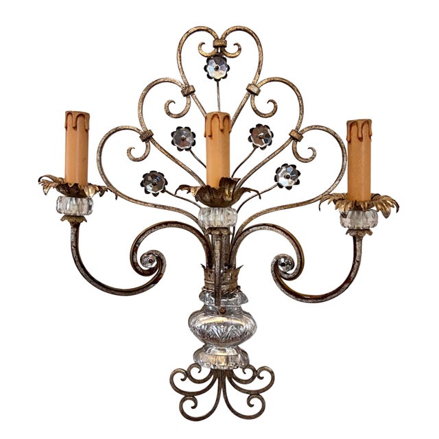 This set of three decorative wall lights is made up of two sconces with three 'candles' and one light with two 'candles'....