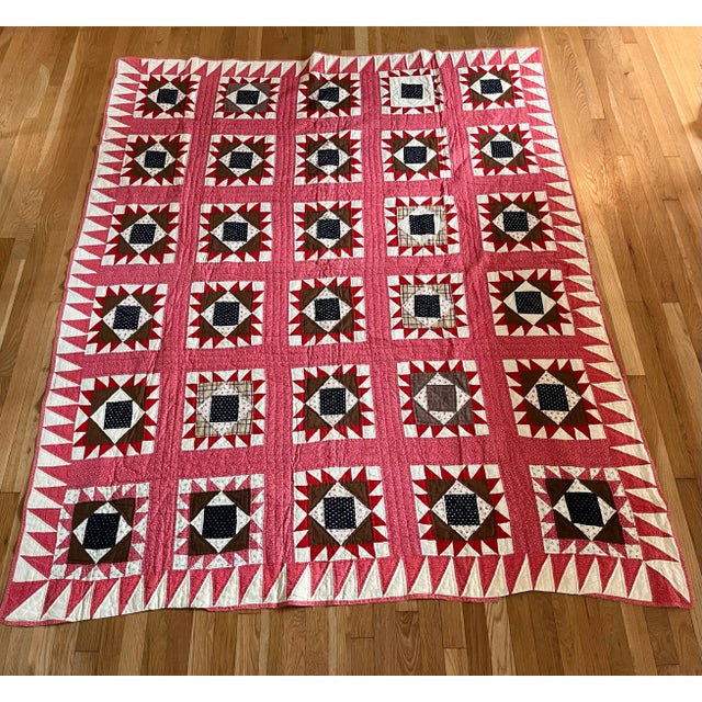 Beautiful antique summer weight hand stitched quilt in beautiful red, white and blue square pattern.