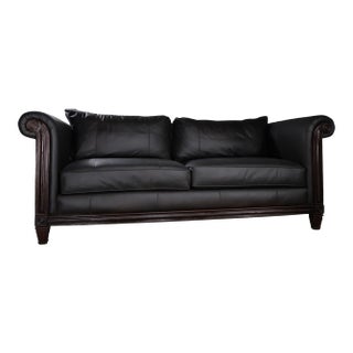 Black Leather Sofa With Carved Wood Base – Classic Rolled Arm Design For Sale