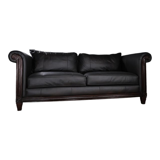 Black Leather Sofa With Carved Wood Base – Classic Rolled Arm Design For Sale