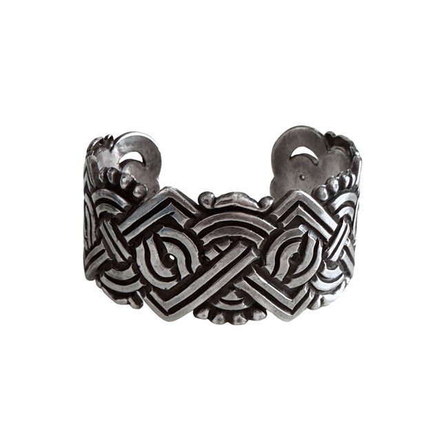 This striking early William Spratling cuff bracelet showcases sculptural geometric openwork in rare .980 fine silver,...