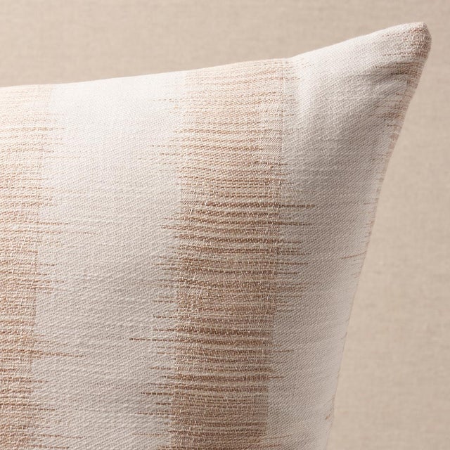 This pillow features Attleboro Ikat with a knife edge finish. Attleboro Ikat is a woven, irregular stripe made of twisted...