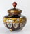 We are selling this small beautiful cloisonne enamel covered urn. This urn has great fine small decoration with flowers in...