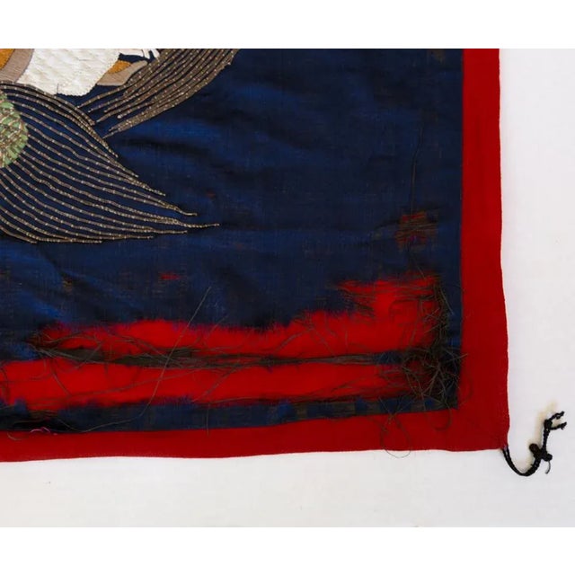 Richly colored antique hand embroidered couched goldwork Asian silk fukusa gift presentation textile featuring an elderly...