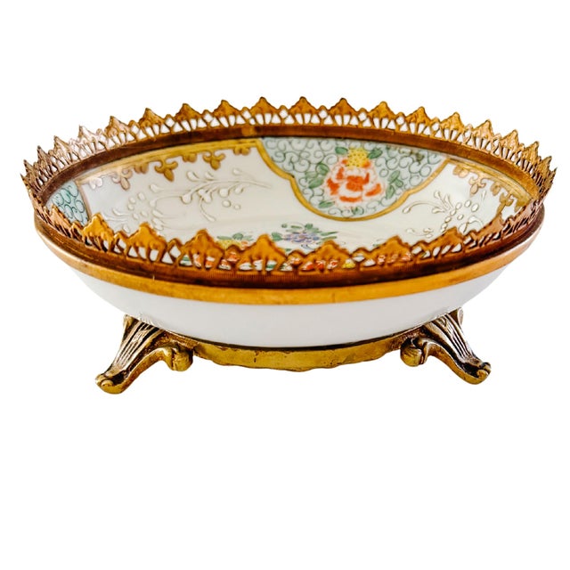 An exquisite, late 19th-century French hard-paste porcelain footed low bowl by the celebrated Parisian firm Edmé Samson et...