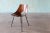 A 1950s Ray Komai chair by J.G. Furniture Company in Brooklyn, New York. The chair features a molded mahogany plywood body...