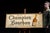 Vintage embossed and lithographed tin advertising sign produced for Champion Bourbon by Schenley Distillers Corporation of...