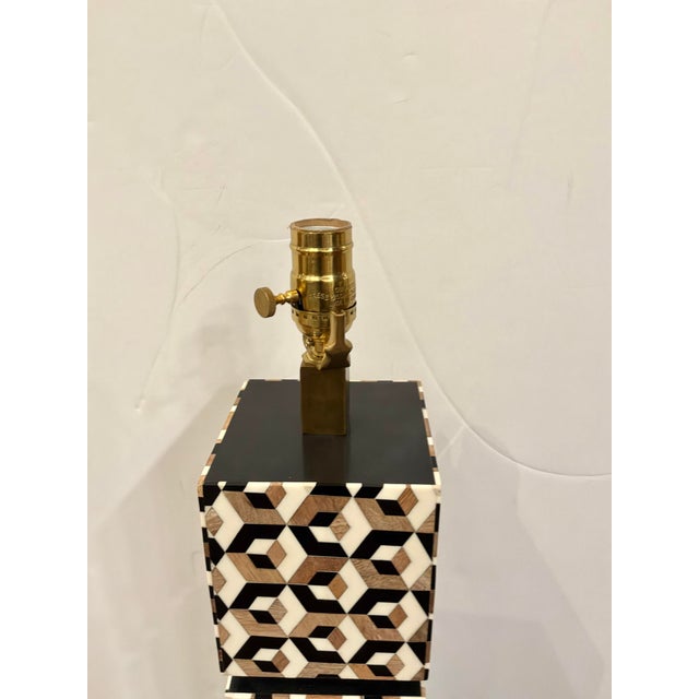 Stylish Currey & Co Marquetry Wood & Resin lamp on black square base. Gold accents. Showroom floor sample.
