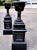 A striking pair of large and weighty antique Victorian cast iron garden urns on tall architectural pedestals, manufactured...