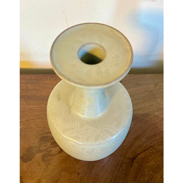 Chinese celadon crackle-glaze mallet vase. Early 20th century in the style of Song Dynasty imperial ceramics, specifically...