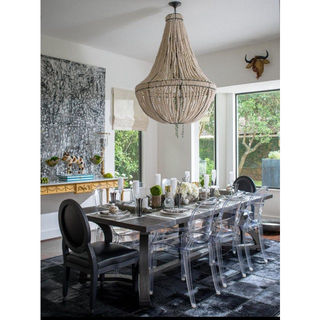 A Beautiful Liaigre Misaine dining table in a very good condition with only one small dent as per image. The table can...