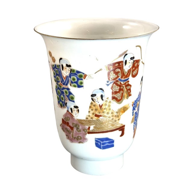 A refined Japanese export porcelain beaker vase produced in the Arita region circa 1860–1880. This elegant eggshell...