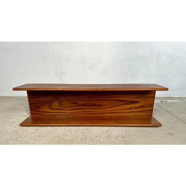 This high-quality minimalist design wall shelf is made from teakwood and real teakwood veneer. At its front it features...