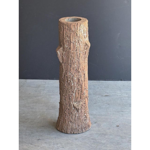 A fine pair of vintage French planters or ornamental tree trunks - each featuring a faux bois design of a tree trunk...