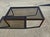 Beautiful Mid-Century Modern coffee table featuring a rare, beautifully grained Brazilian rosewood frame paired with a...