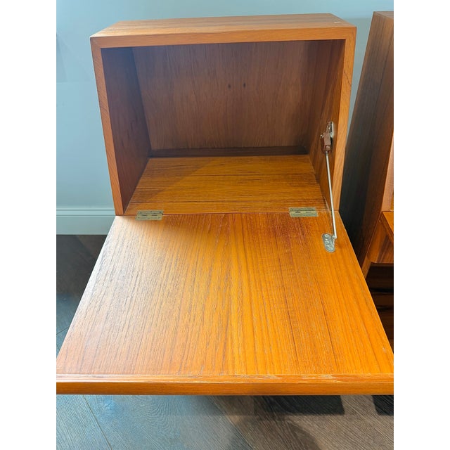 A rare and beautifully preserved pair of vintage Danish modern nightstands by Nordisk Andels-Eksport (NAE), crafted in...