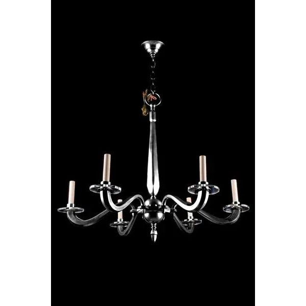Art deco style 6 arm chandelier with sectioned fluted arms and glass bobeches.