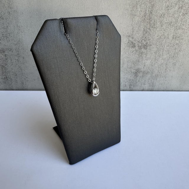 Elevate your elegance with this Natural Diamond Solitaire Necklace in 14kt White Gold. Featuring a brilliant 0.25ctw round...