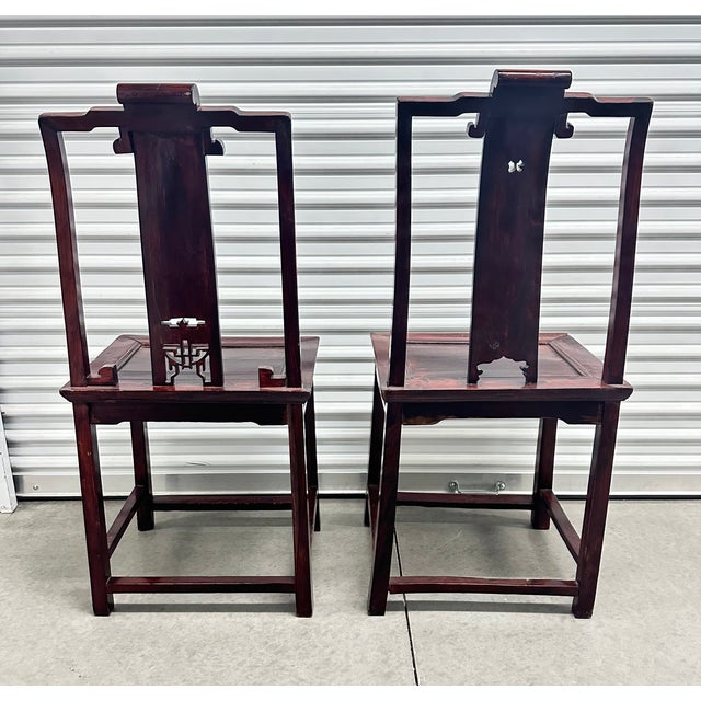 Antique Ming high Yoke Back Chairs circa 19th century. chairs are exquisitely hand-carved backing and design skirt with...