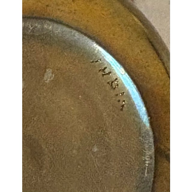 Multi-tone brass floral lidded round small box. Excellent condition.