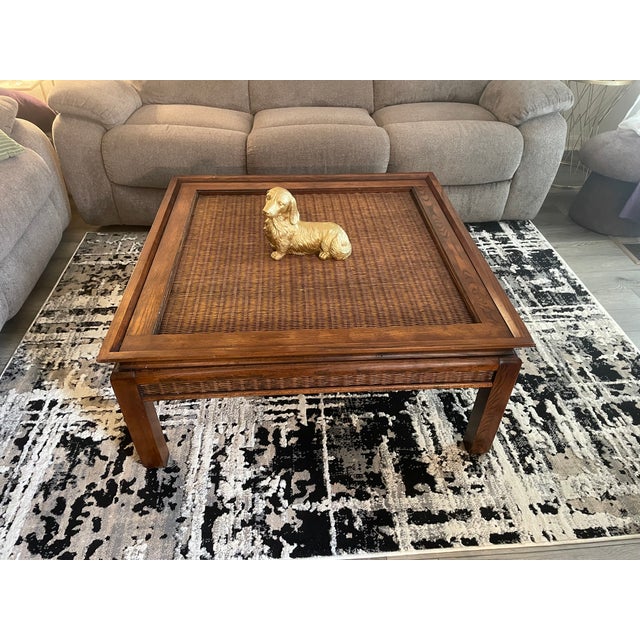 A striking mid-to-late 20th-century square coffee table executed in the timeless Asian Modern / Chinoiserie style. Built...