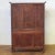 This cupboard is most likely of Welsh origins and features 2 doors above and 3,2,1 arrangement of drawers, all with...