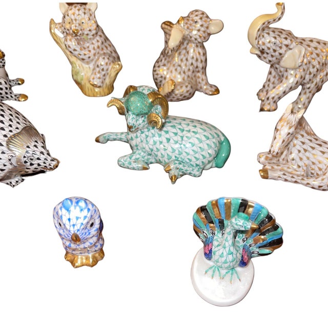 Charming set of nine Herend Hungary porcelain animal figurines, each decorated in the brand’s iconic hand-painted fishnet...