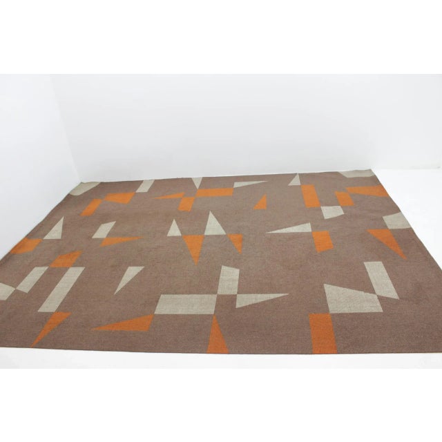 - Designed in former Czechoslovakia in the 1970s - Brown, white, and orange colors - Simple Bouclé design - Original...