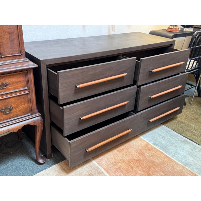 Design Plus Gallery presents a Double Dresser from Brownstone. The dresser is striking in its design and, for some reason,...