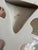 A beautiful pair of vintage white glazed ceramic wall brackets featuring elegant Rococo-inspired styling. Each bracket is...