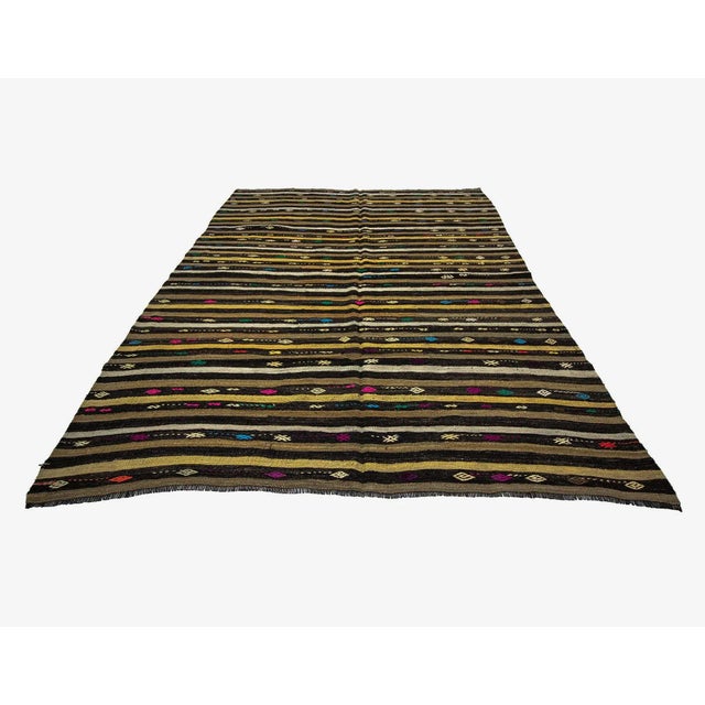 Striped vintage Kilim rug from Afyon region of Turkey. Approximately 50-60 years old. In very good condition