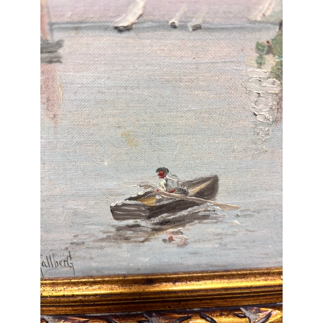 Coastal Oil Painting Depicts a Tranquil Harbor Scene With Fishing Boats Moored by a Pier and a Small Rowboat in the Calm Water. By J .Henry Hallbert For Sale - Image 3 of 12