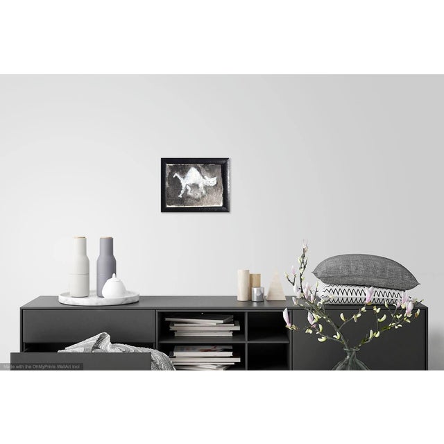 Little white kitten. Ink and gouache on handmade paper. Presented under glass in a black wood frame, wired and ready to...