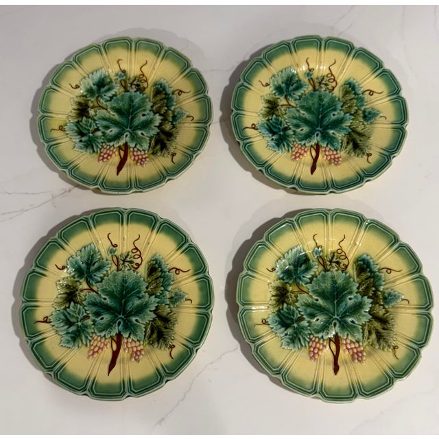 A rare and exceptional matched set of four Sarreguemines majolica plates, crafted in France circa 1890. This sought-after...