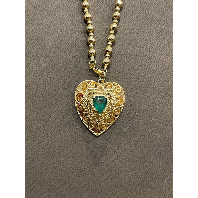Vintage 14 Karat Yellow Gold Heart Locket and Natural Emerald Heart Locket is 12 inch wide and 1.3 Inch long CHAIN IS NOT...
